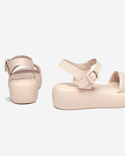 OUTLET Sandales pour femme en éco-cuir matelassé sur un talon compensé de couleur beige Baloui. Chaussure