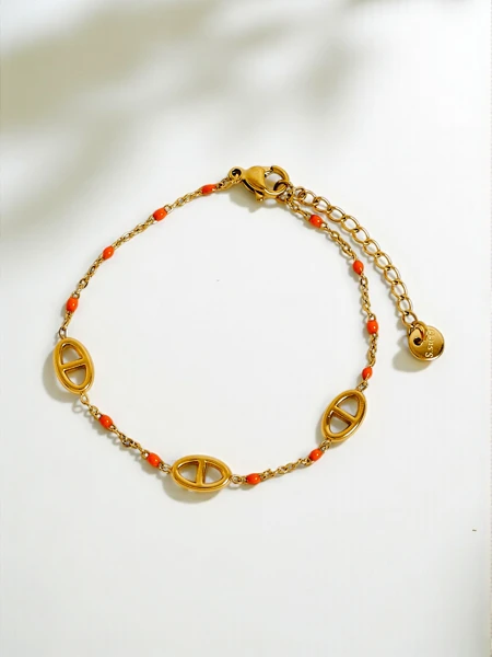 Aurelia Perseus - bracelet doré élégant avec motif géométrique