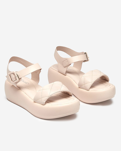 OUTLET Sandales pour femme en éco-cuir matelassé sur un talon compensé de couleur beige Baloui. Chaussure