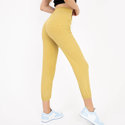 Pantalon en tissu pour femme jaune avec un patch - Vêtements