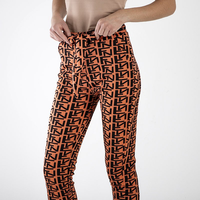Pantalon femme orange à motifs - Vêtements
