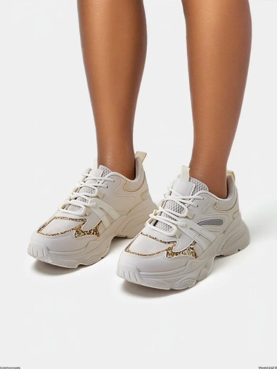Baskets de sport pour femmes Royalfashion sur une semelle épaisse Aimo