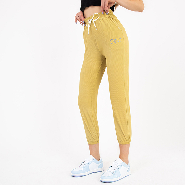 Pantalon en tissu pour femme jaune avec un patch - Vêtements