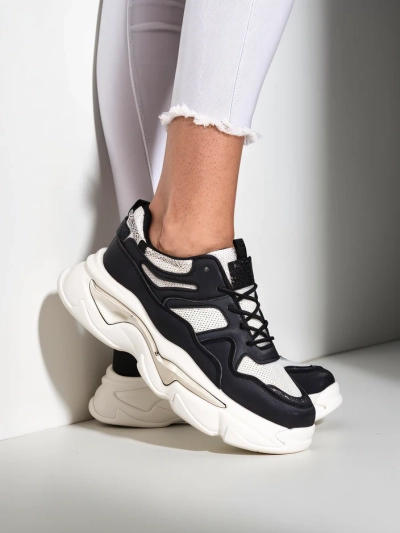 Baskets pour femmes Royalfashion sur une semelle épaisse Lesalli