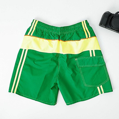 Short de sport vert pour homme avec empiècements jaunes - Vêtements