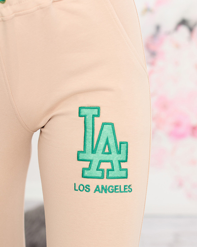 Jogging femme beige avec patch coloré - Vêtements