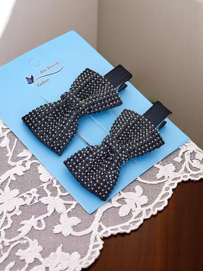Royalfashion Lot de 2 barrettes avec nœuds et strass Isadora