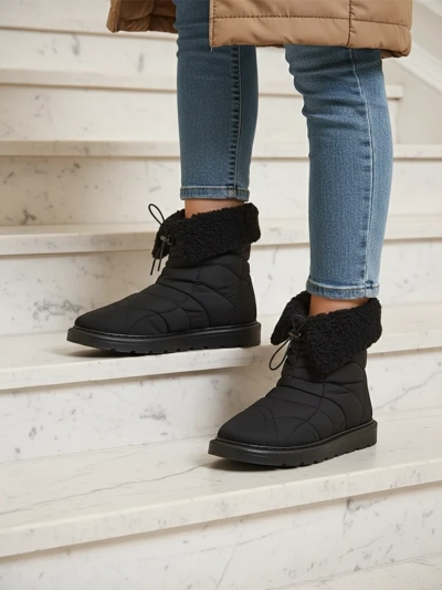 Bottes pour femmes Royalfashion comme des bottes de neige Oferita
