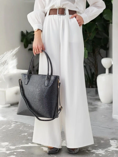 Sac à main en cuir verni pour femmes avec embossage
