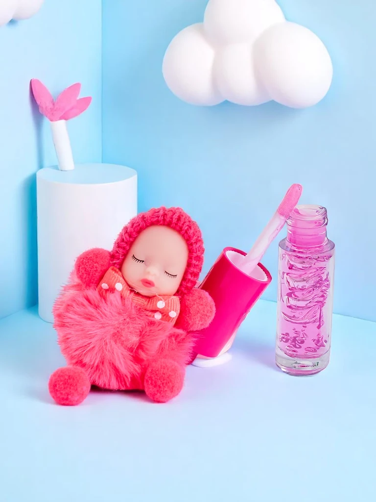 Gloss à lèvres pour enfants avec une poupée Fuchsia
