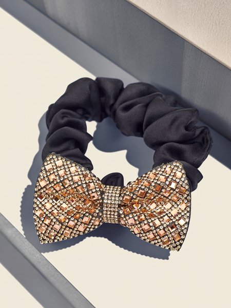 Élastique à cheveux Royalfashion avec nœud décoratif Bellissa