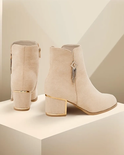 Royalfashion Bottes pour femmes en éco-daim sur un article Egris