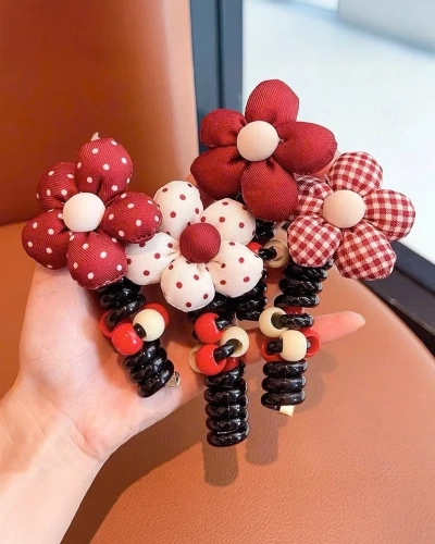 Royalfashion Elastique à cheveux en spirale avec une petite fleur Blossom Coil