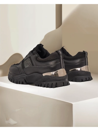 Baskets pour femmes Arete Nero à semelle plate en cuir écologique