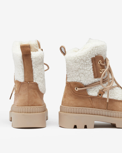 Royalfashion Bottes de trappeur en peau de mouton beige Getatsa