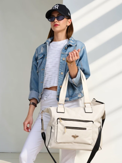 Sac à main Royalfashion pour femmes en éco-cuir avec une poche à l'avant