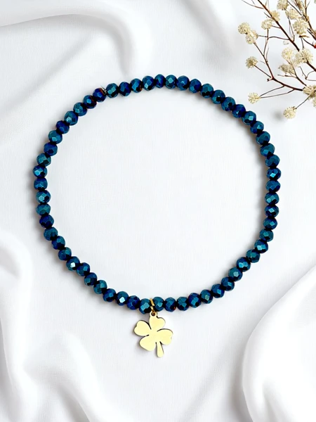 Bracelet pour femme Royalfashion avec un pendentif trèfle