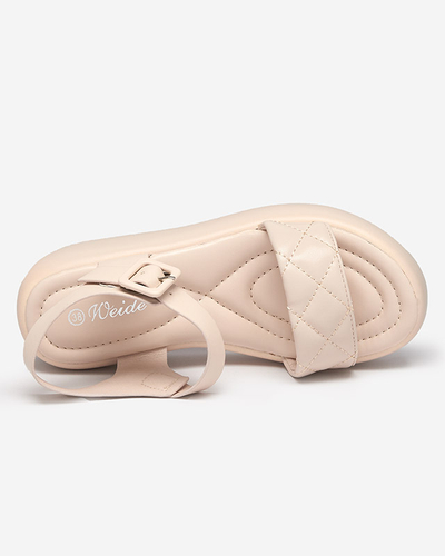 OUTLET Sandales pour femme en éco-cuir matelassé sur un talon compensé de couleur beige Baloui. Chaussure