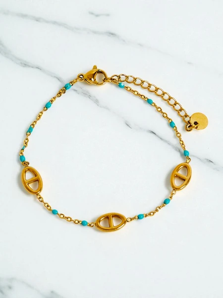 Aurelia Perseus - bracelet doré élégant avec motif géométrique