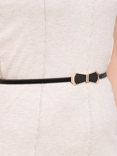 Ceinture métallique pour femme Melina noire avec boucle décorative style glamour