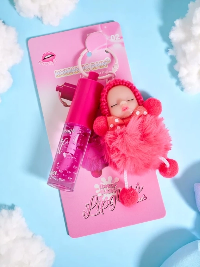 Gloss à lèvres pour enfants avec une poupée Fuchsia