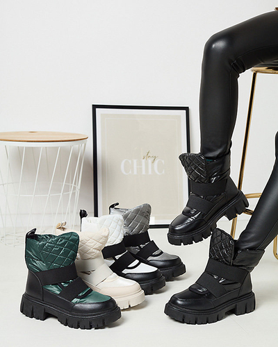 Bottes de neige pour femmes à semelle plate en noir et blanc Ferory- Footwear