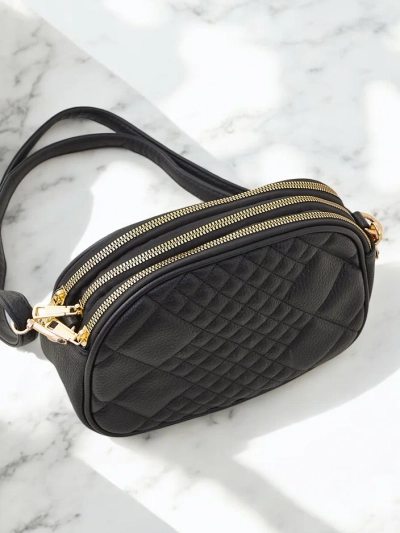 Royalfashion Petit sac à main ovale pour femmes en cuir éco.