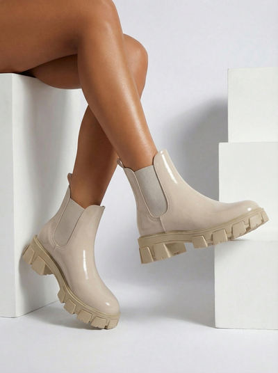 Royalfashion Bottines à semelle massive en cuir écologique verni Calista Weide