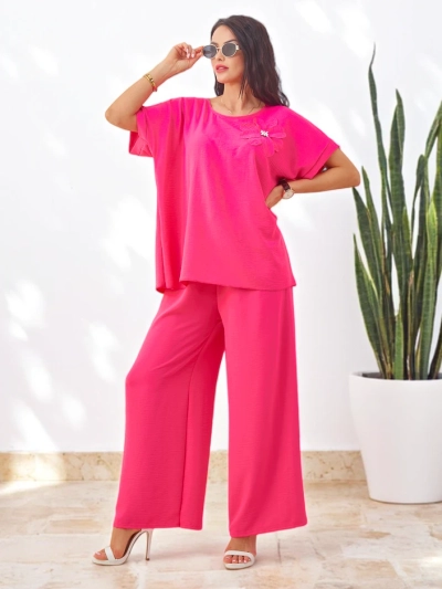 Ensemble Royalfashion pour femmes avec des manches courtes, fleur décorative et pantalon large