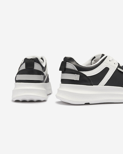 Chaussures de sport décontractées en cuir écologique pour femmes, noires, avec empiècements blancs Netiris - Chaussures